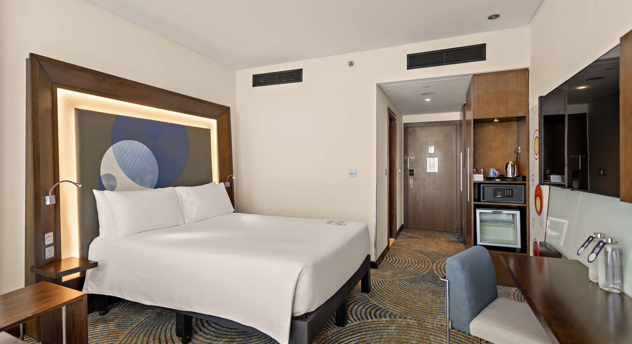 Hotel near Yas Superior Room interior at Novotel Gate Abu Dhabi with modern amenities