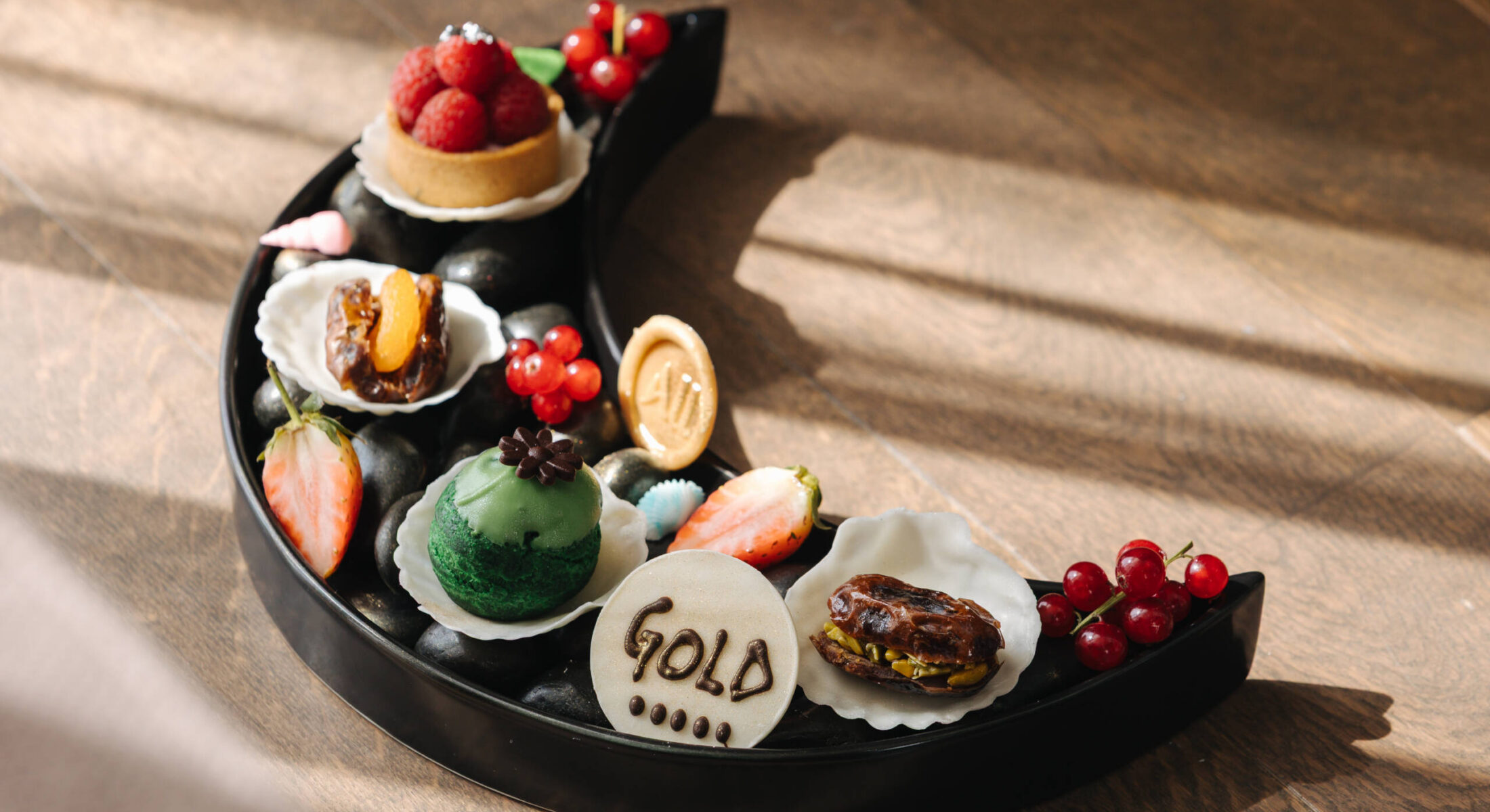 Signature desserts and Arabic sweets at Novotel Gate Abu Dhabi restaurant in Abu Dhabi