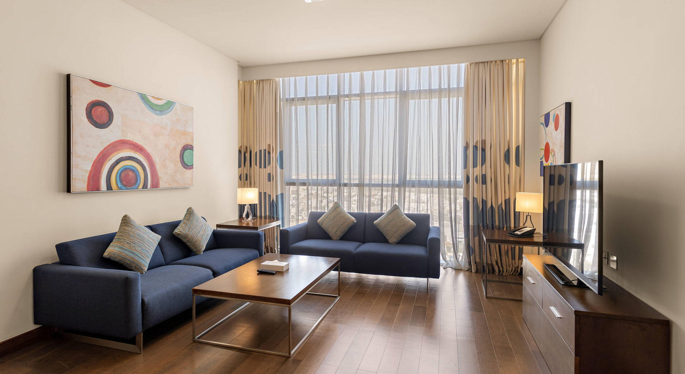 Living area in one-bedroom apartment at Grand Mosque Abu Dhabi hotel